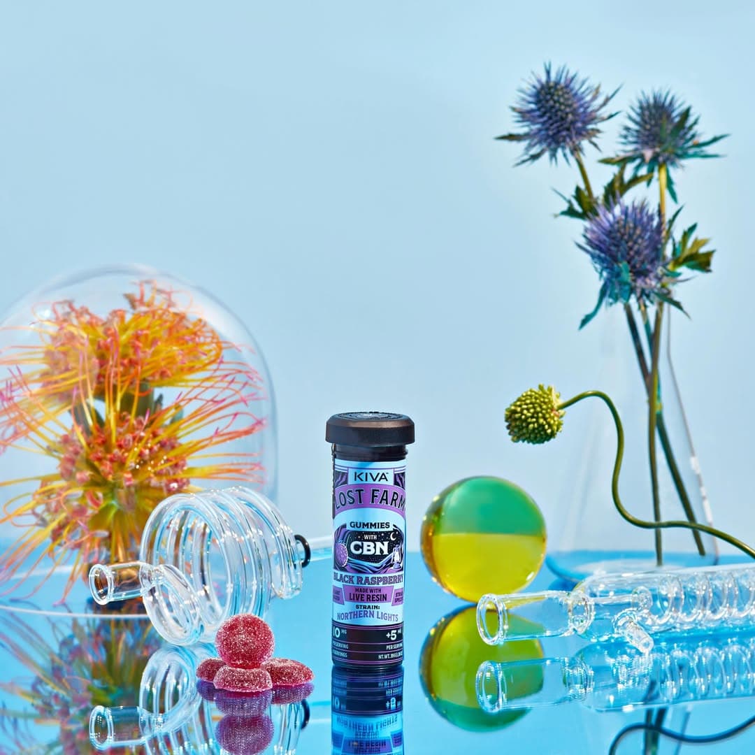 Lost Farm CBN black raspberry gummies by Kiva with glass art and botanical decor in New Jersey